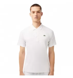 Polo Lacoste Worldwide Ribbed Performance coloris blanc uni