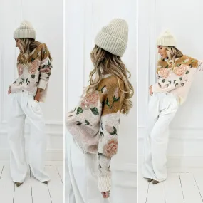 Pull fleuri sequins