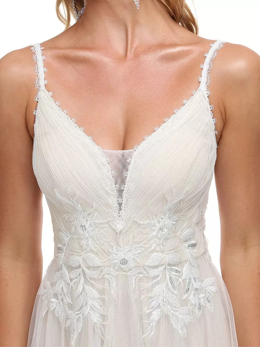 Robe de mariée A-ligne à encolure en V brodée à bretelles spaghetti