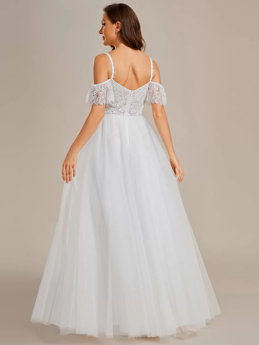 Robe de mariée romantique en dentelle transparente avec corsage et bretelles spaghetti à manches courtes en tulle