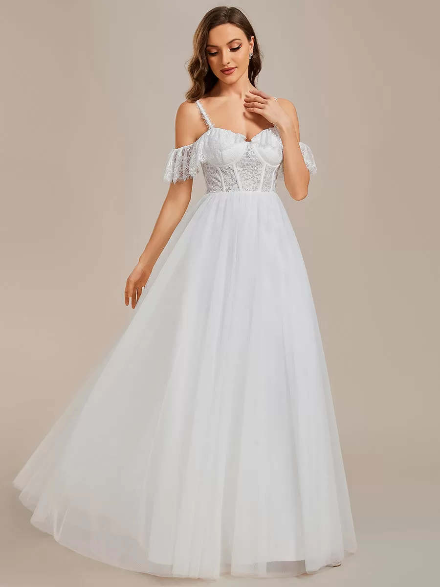 Robe de mariée romantique en dentelle transparente avec corsage et bretelles spaghetti à manches courtes en tulle