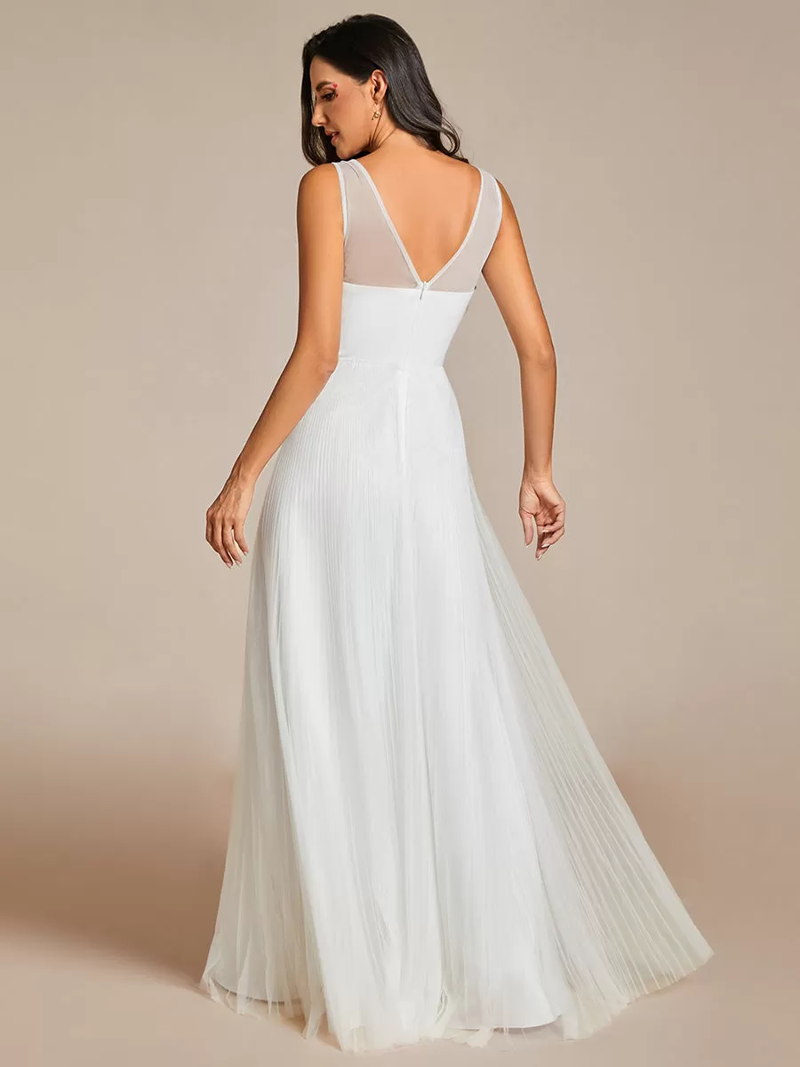 Robe de soirée en tulle trapèze sans manches avec corsage brodé d'appliques exquises