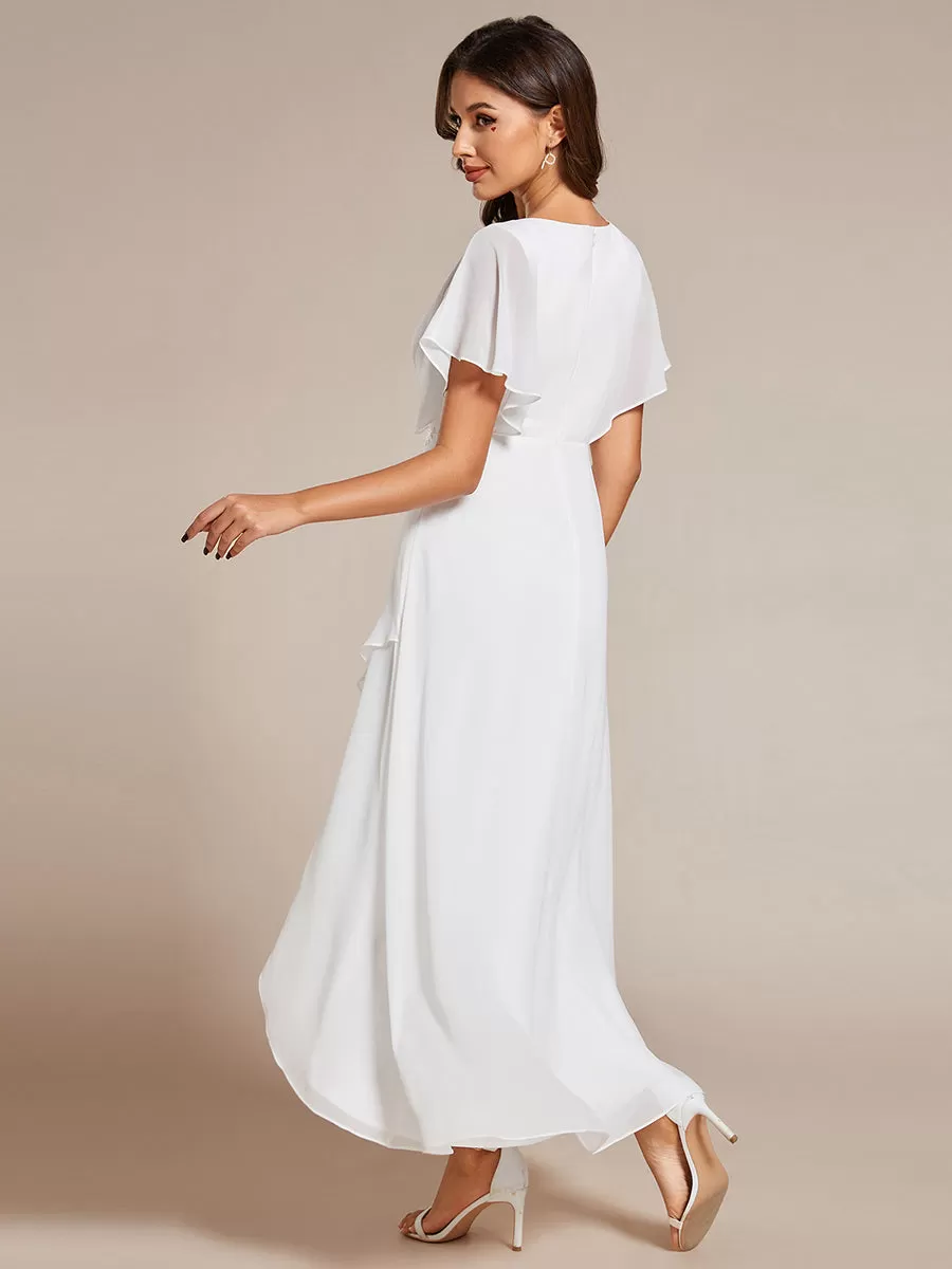 Robe Formelle élégante à Manches Courtes Et Taille Trapèze Avec Ourlet En Feuille De Lotus