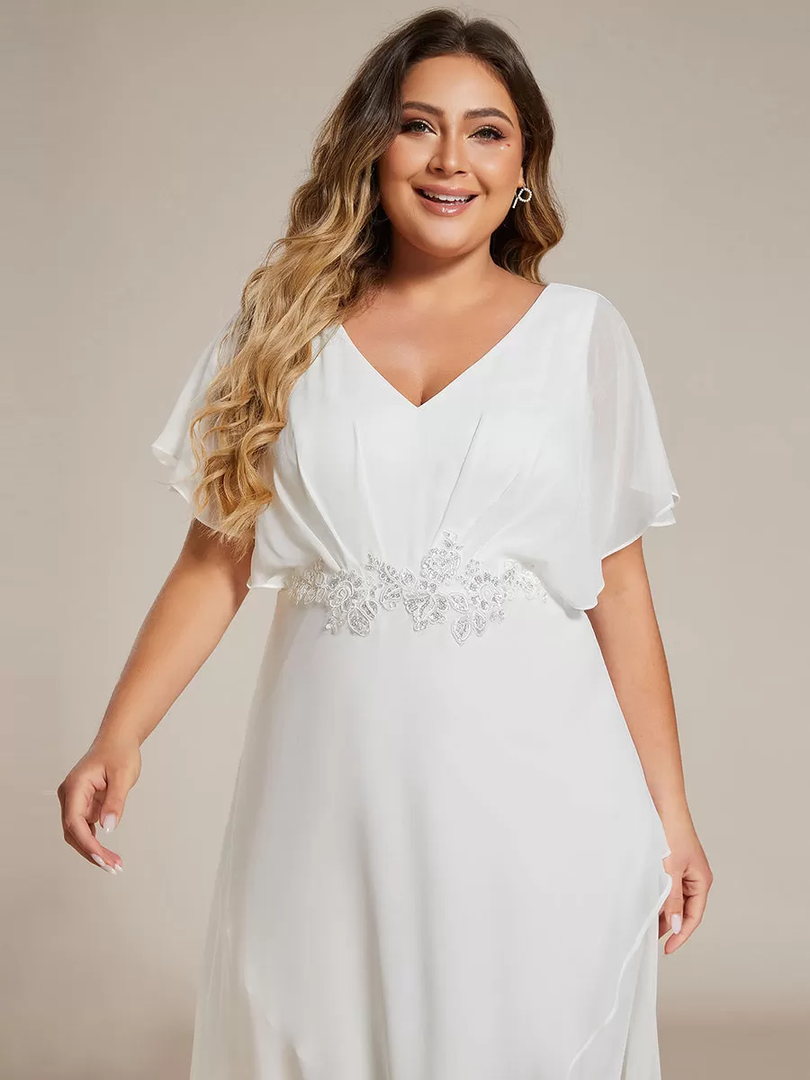 Robe Formelle élégante à Manches Courtes Et Taille Trapèze Avec Ourlet En Feuille De Lotus