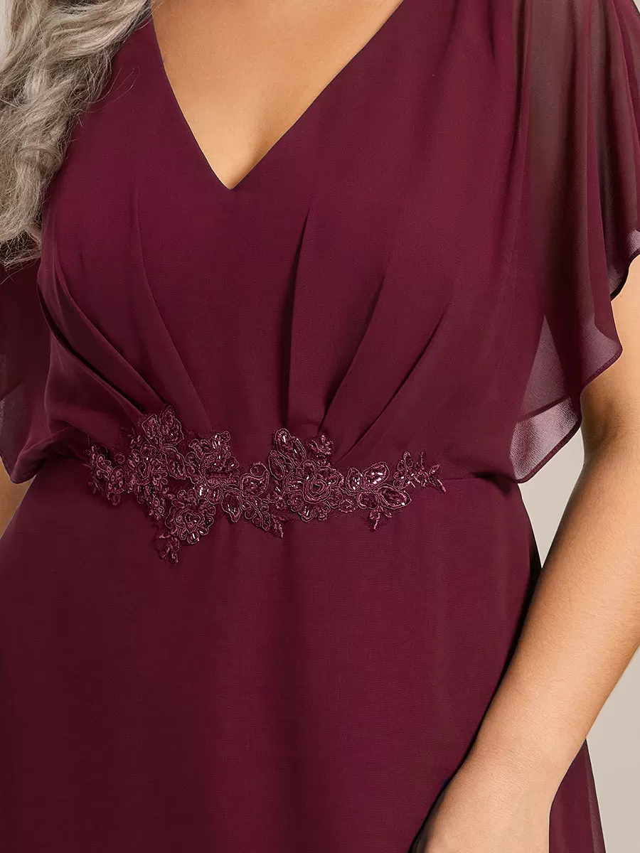Robe Formelle élégante à Manches Courtes Et Taille Trapèze Avec Ourlet En Feuille De Lotus