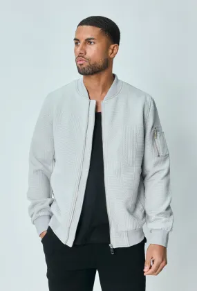 Veste teddy uni motifs géométriques